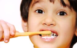 Boy brushing teeth - Smile Dental Group